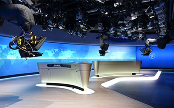 Robotic camera in news studio